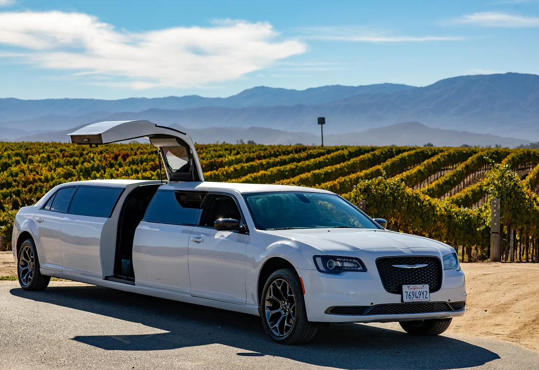 Temecula Limos white stretch limousine parked at a vineyard in Temecula wine country